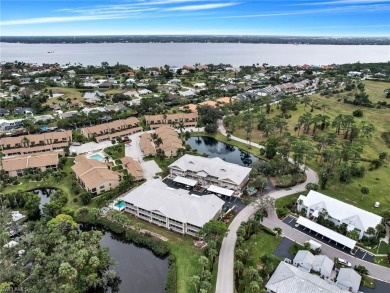 This first floor condo overlooks the tranquil waterway of Indian on Riverbend Golf and Country Club in Florida - for sale on GolfHomes.com, golf home, golf lot