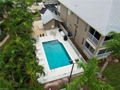 This first floor condo overlooks the tranquil waterway of Indian on Riverbend Golf and Country Club in Florida - for sale on GolfHomes.com, golf home, golf lot