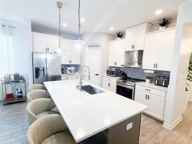 MANY UPGRADES!! Welcome to this exclusive gated community of on The Oasis Club at Champions Gate in Florida - for sale on GolfHomes.com, golf home, golf lot