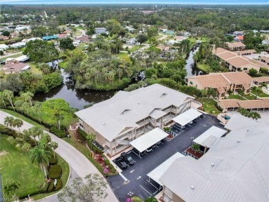 This first floor condo overlooks the tranquil waterway of Indian on Riverbend Golf and Country Club in Florida - for sale on GolfHomes.com, golf home, golf lot