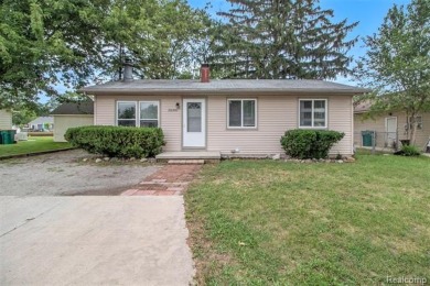 Nestled at the end of a quiet dead-end street, this beautifully on Lake Erie Metropark Golf Course in Michigan - for sale on GolfHomes.com, golf home, golf lot