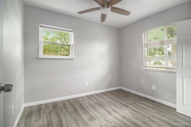 Nestled at the end of a quiet dead-end street, this beautifully on Lake Erie Metropark Golf Course in Michigan - for sale on GolfHomes.com, golf home, golf lot