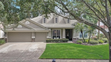 Welcome to your dream home in the desirable Kentford Gardens on Heathrow Country Club in Florida - for sale on GolfHomes.com, golf home, golf lot