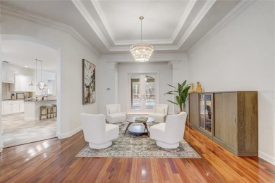 Welcome to your dream home in the desirable Kentford Gardens on Heathrow Country Club in Florida - for sale on GolfHomes.com, golf home, golf lot