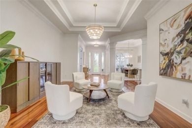 Welcome to your dream home in the desirable Kentford Gardens on Heathrow Country Club in Florida - for sale on GolfHomes.com, golf home, golf lot
