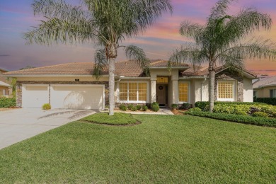 Beautifully situated on a private cul-de-sac backing to a nature on Baytree National Golf Links in Florida - for sale on GolfHomes.com, golf home, golf lot