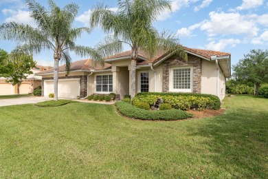 Beautifully situated on a private cul-de-sac backing to a nature on Baytree National Golf Links in Florida - for sale on GolfHomes.com, golf home, golf lot