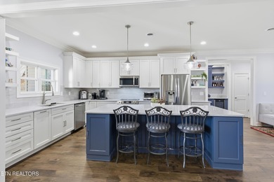 This elegant home offers a whopping 2,660 sq ft of main level on Tellico Village Golf Club in Tennessee - for sale on GolfHomes.com, golf home, golf lot