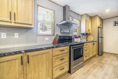 Welcome to your dream retreat! This delightful 3-bedroom on Whispering Pines in South Carolina - for sale on GolfHomes.com, golf home, golf lot