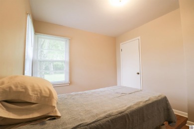 This charming 3-bedroom, 1-bathroom home offers incredible on Rolling Hills Country Club in Kentucky - for sale on GolfHomes.com, golf home, golf lot