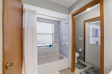 Under contract-accepting backup offers. Tucked onto a generous 0 on Spring Hill Golf Course in Florida - for sale on GolfHomes.com, golf home, golf lot