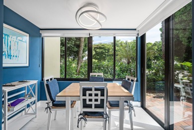 Welcome to this inviting 1st‑floor home showcasing serene on Quail Ridge Golf Course and Country Club in Florida - for sale on GolfHomes.com, golf home, golf lot