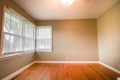 This charming 3-bedroom, 1-bathroom home offers incredible on Rolling Hills Country Club in Kentucky - for sale on GolfHomes.com, golf home, golf lot
