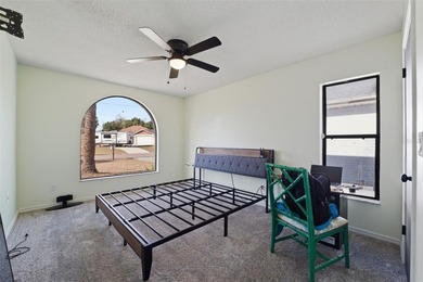 Under contract-accepting backup offers. Tucked onto a generous 0 on Spring Hill Golf Course in Florida - for sale on GolfHomes.com, golf home, golf lot