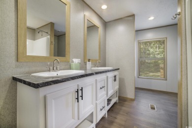 Welcome to your dream retreat! This delightful 3-bedroom on Whispering Pines in South Carolina - for sale on GolfHomes.com, golf home, golf lot