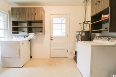 This charming 3-bedroom, 1-bathroom home offers incredible on Rolling Hills Country Club in Kentucky - for sale on GolfHomes.com, golf home, golf lot