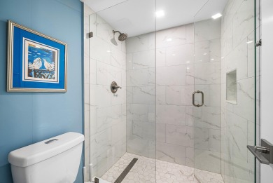 Welcome to this inviting 1st‑floor home showcasing serene on Quail Ridge Golf Course and Country Club in Florida - for sale on GolfHomes.com, golf home, golf lot