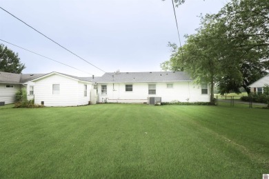 This charming 3-bedroom, 1-bathroom home offers incredible on Rolling Hills Country Club in Kentucky - for sale on GolfHomes.com, golf home, golf lot