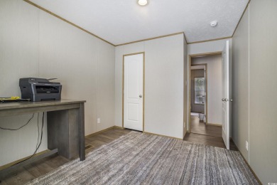 Welcome to your dream retreat! This delightful 3-bedroom on Whispering Pines in South Carolina - for sale on GolfHomes.com, golf home, golf lot