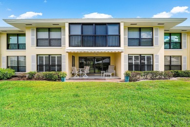 Welcome to this inviting 1st‑floor home showcasing serene on Quail Ridge Golf Course and Country Club in Florida - for sale on GolfHomes.com, golf home, golf lot