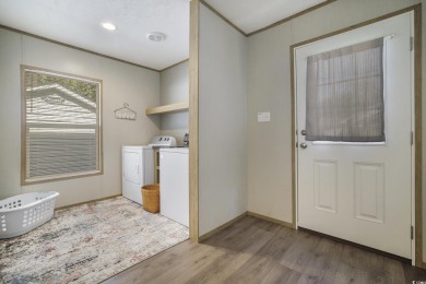 Welcome to your dream retreat! This delightful 3-bedroom on Whispering Pines in South Carolina - for sale on GolfHomes.com, golf home, golf lot