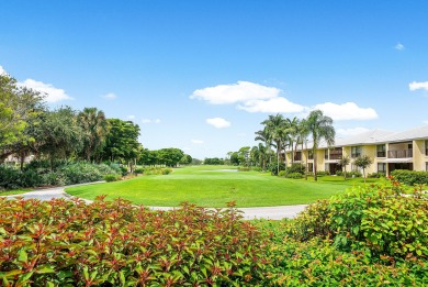 Welcome to this inviting 1st‑floor home showcasing serene on Quail Ridge Golf Course and Country Club in Florida - for sale on GolfHomes.com, golf home, golf lot