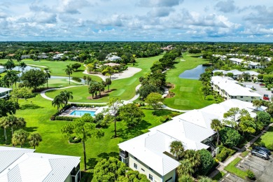 Welcome to this inviting 1st‑floor home showcasing serene on Quail Ridge Golf Course and Country Club in Florida - for sale on GolfHomes.com, golf home, golf lot