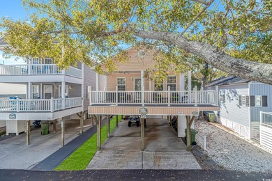 This spacious 3 Bedroom 2 Bath raised beach house is just a very on Prestwick Country Club in South Carolina - for sale on GolfHomes.com, golf home, golf lot