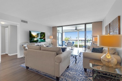 Step into paradise with this beautifully updated 2-bedroom on Ocean Village Golf Course in Florida - for sale on GolfHomes.com, golf home, golf lot
