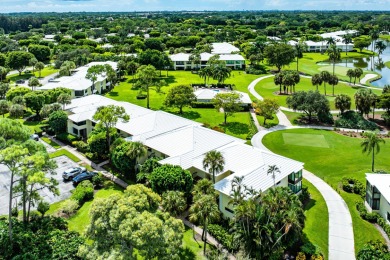 Welcome to this inviting 1st‑floor home showcasing serene on Quail Ridge Golf Course and Country Club in Florida - for sale on GolfHomes.com, golf home, golf lot