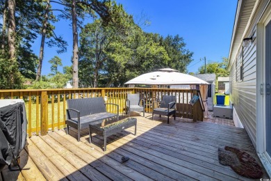 Welcome to your dream retreat! This delightful 3-bedroom on Whispering Pines in South Carolina - for sale on GolfHomes.com, golf home, golf lot
