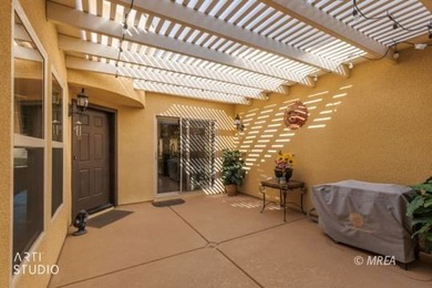 Stone facade adds aesthetic appeal to this 2-BR home plus den on Conestoga Golf Club in Nevada - for sale on GolfHomes.com, golf home, golf lot