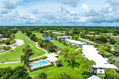 Welcome to this inviting 1st‑floor home showcasing serene on Quail Ridge Golf Course and Country Club in Florida - for sale on GolfHomes.com, golf home, golf lot