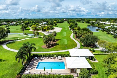 Welcome to this inviting 1st‑floor home showcasing serene on Quail Ridge Golf Course and Country Club in Florida - for sale on GolfHomes.com, golf home, golf lot