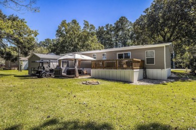 Welcome to your dream retreat! This delightful 3-bedroom on Whispering Pines in South Carolina - for sale on GolfHomes.com, golf home, golf lot