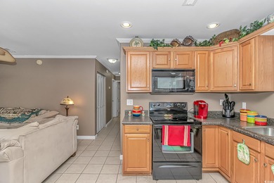 This spacious 3 Bedroom 2 Bath raised beach house is just a very on Prestwick Country Club in South Carolina - for sale on GolfHomes.com, golf home, golf lot