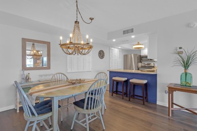 Step into paradise with this beautifully updated 2-bedroom on Ocean Village Golf Course in Florida - for sale on GolfHomes.com, golf home, golf lot
