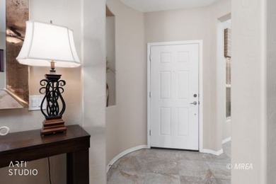 Stone facade adds aesthetic appeal to this 2-BR home plus den on Conestoga Golf Club in Nevada - for sale on GolfHomes.com, golf home, golf lot