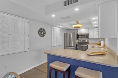Step into paradise with this beautifully updated 2-bedroom on Ocean Village Golf Course in Florida - for sale on GolfHomes.com, golf home, golf lot