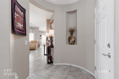 Stone facade adds aesthetic appeal to this 2-BR home plus den on Conestoga Golf Club in Nevada - for sale on GolfHomes.com, golf home, golf lot