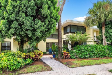 Welcome to this inviting 1st‑floor home showcasing serene on Quail Ridge Golf Course and Country Club in Florida - for sale on GolfHomes.com, golf home, golf lot