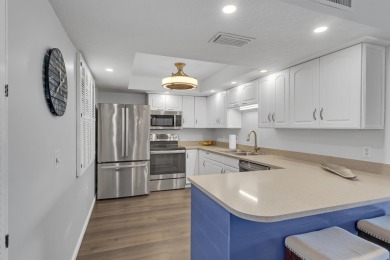 Step into paradise with this beautifully updated 2-bedroom on Ocean Village Golf Course in Florida - for sale on GolfHomes.com, golf home, golf lot