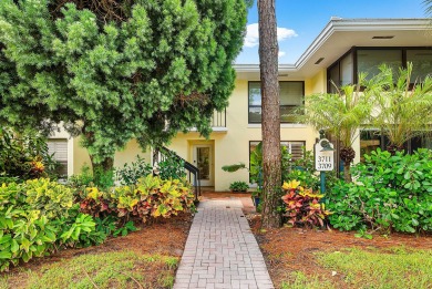 Welcome to this inviting 1st‑floor home showcasing serene on Quail Ridge Golf Course and Country Club in Florida - for sale on GolfHomes.com, golf home, golf lot