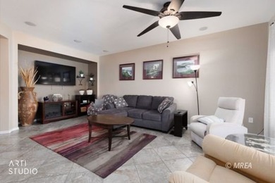 Stone facade adds aesthetic appeal to this 2-BR home plus den on Conestoga Golf Club in Nevada - for sale on GolfHomes.com, golf home, golf lot