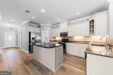 Enjoy low-maintenance golf-course living in this well maintained on Laurel Island Links in Georgia - for sale on GolfHomes.com, golf home, golf lot