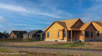 Welcome to 299 Bald Eagle Drive! This new construction home is a on Teton Reserve in Idaho - for sale on GolfHomes.com, golf home, golf lot