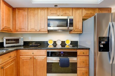 This beautifully updated second-floor unit showcases quality on Capri Isle Golf Club in Florida - for sale on GolfHomes.com, golf home, golf lot