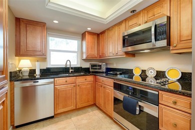 This beautifully updated second-floor unit showcases quality on Capri Isle Golf Club in Florida - for sale on GolfHomes.com, golf home, golf lot