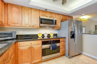 This beautifully updated second-floor unit showcases quality on Capri Isle Golf Club in Florida - for sale on GolfHomes.com, golf home, golf lot