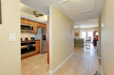 This beautifully updated second-floor unit showcases quality on Capri Isle Golf Club in Florida - for sale on GolfHomes.com, golf home, golf lot